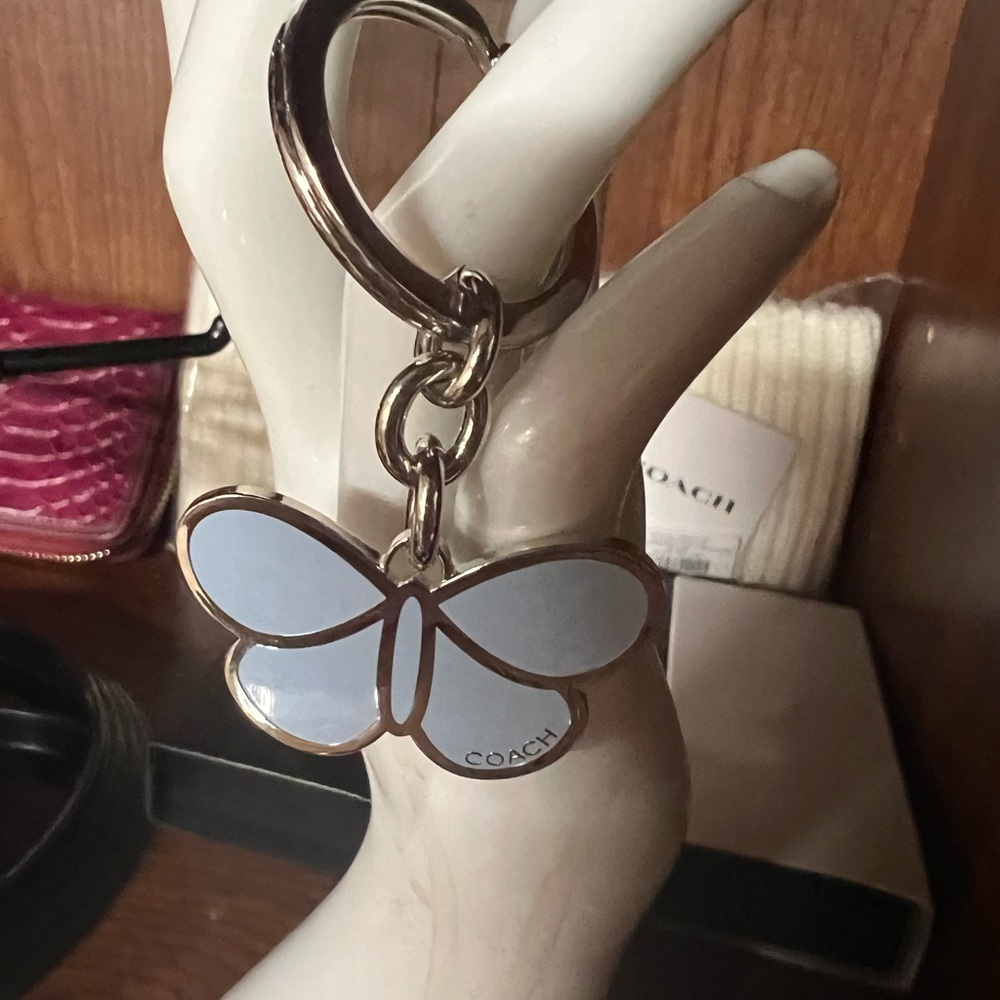 NWOT Rare Vintage Coach Silver and Light Blue Butterfly Keychain.
